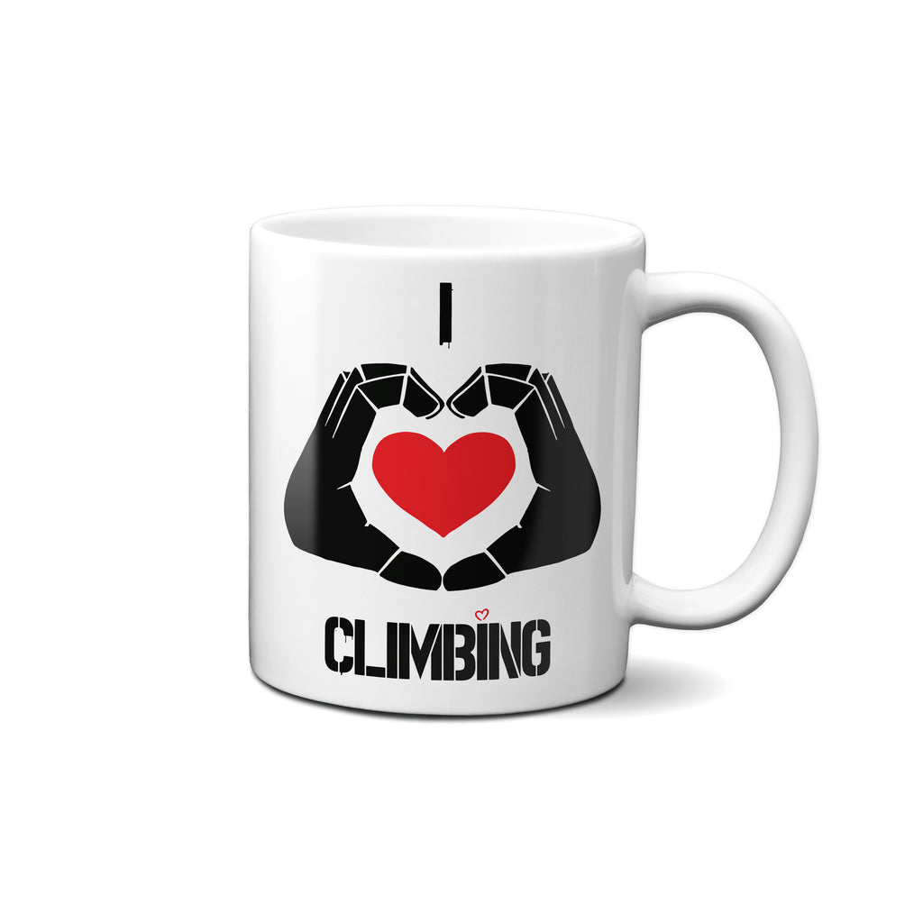 White ceramic 'I love climbing' mug. I and climbing in words, with a big red heart in the middlewith 
