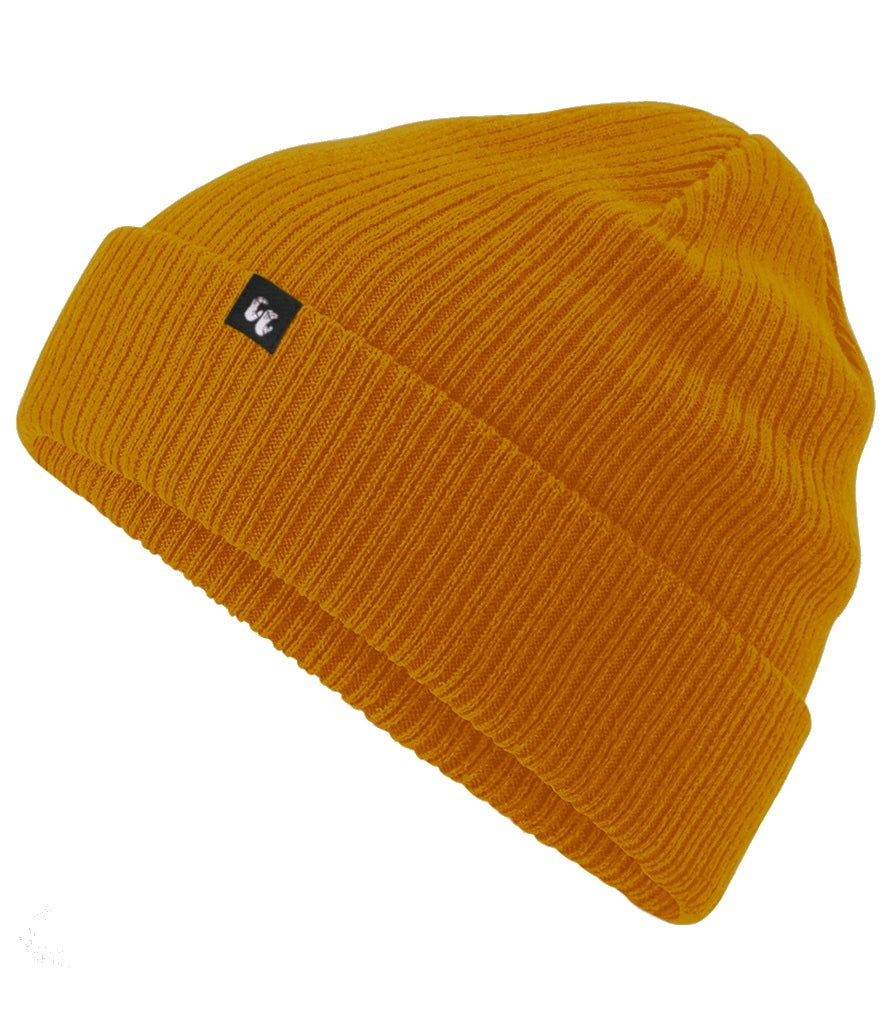 Mustard yellow organic cotton beanie hat with black fabric tag stitched to the cuff