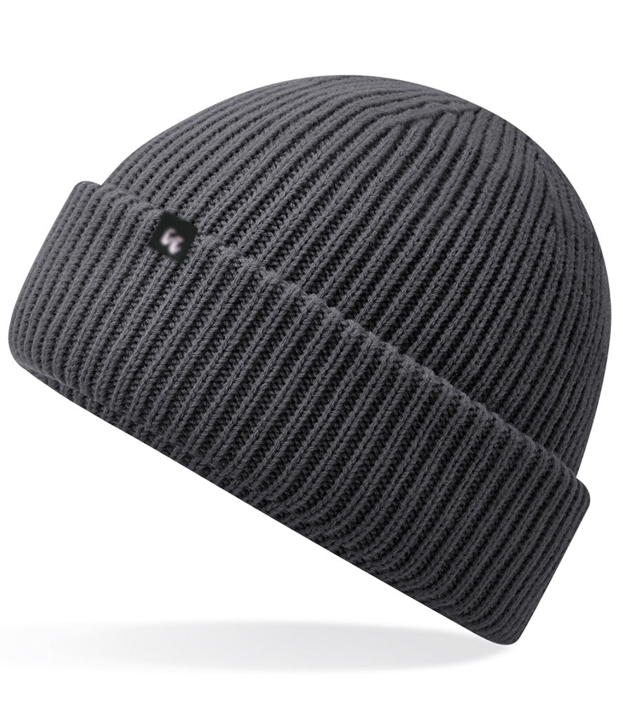 Recycled polyester beanie in grey with a small black fabric tag on the front left-hand side. 