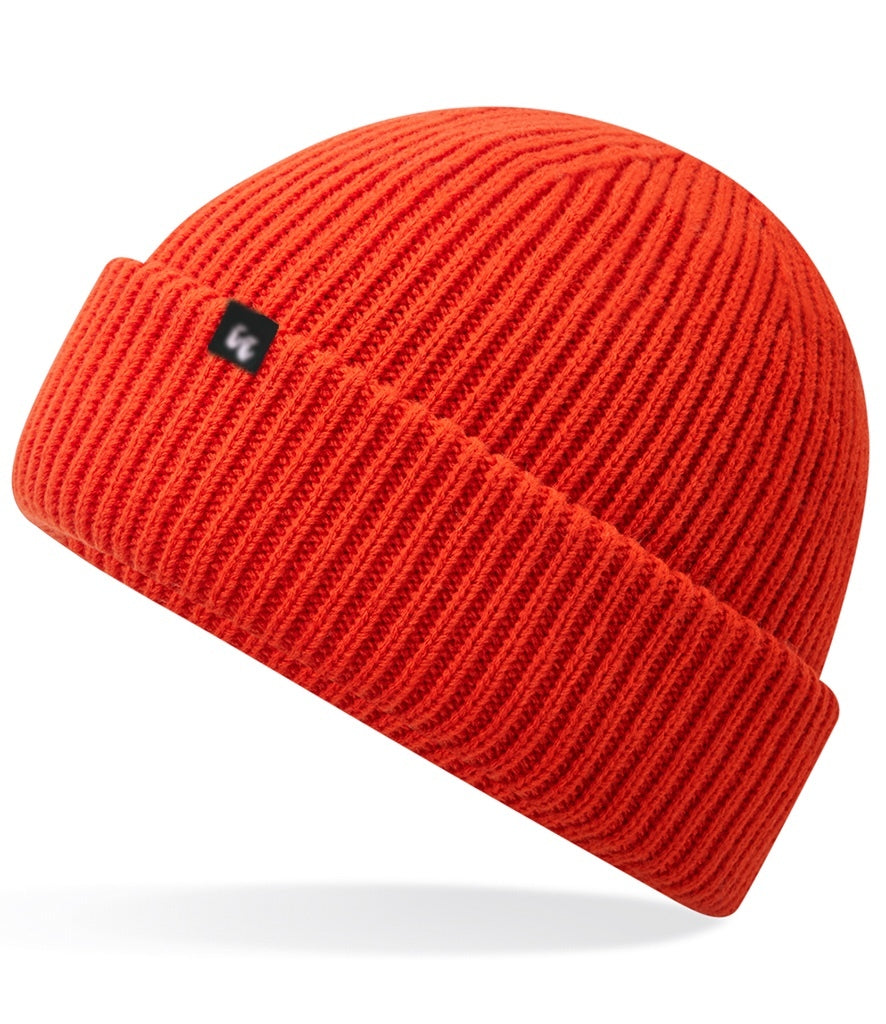Recycled polyester beanie in fire red with a small black fabric tag on the front left-hand side. 